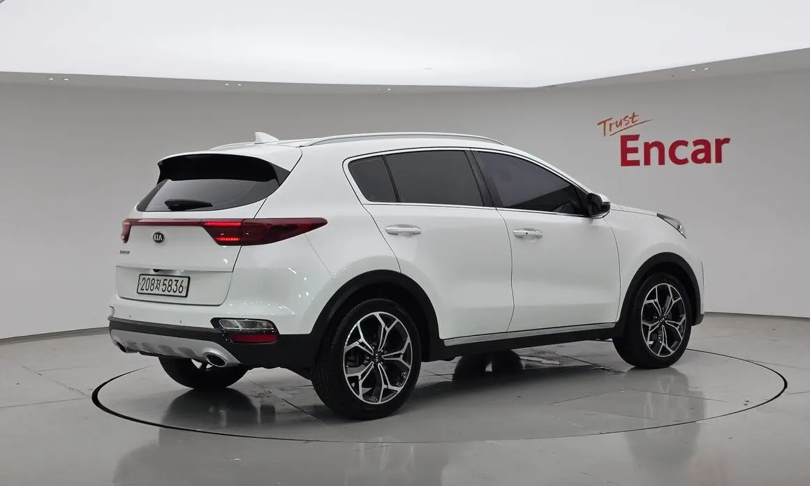Kia Sportage — фото 7