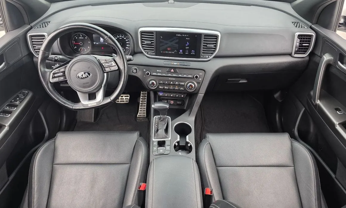Kia Sportage — фото 10