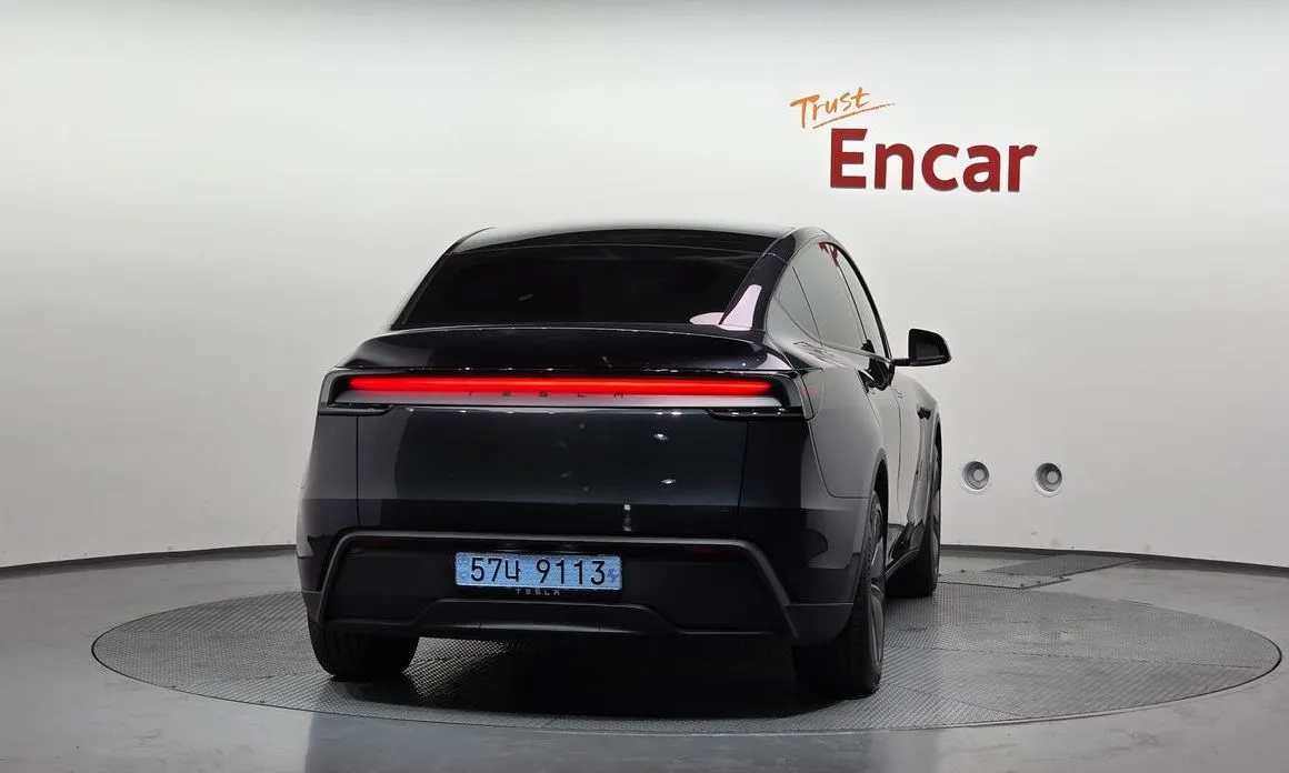 Tesla Model Y — фото 4