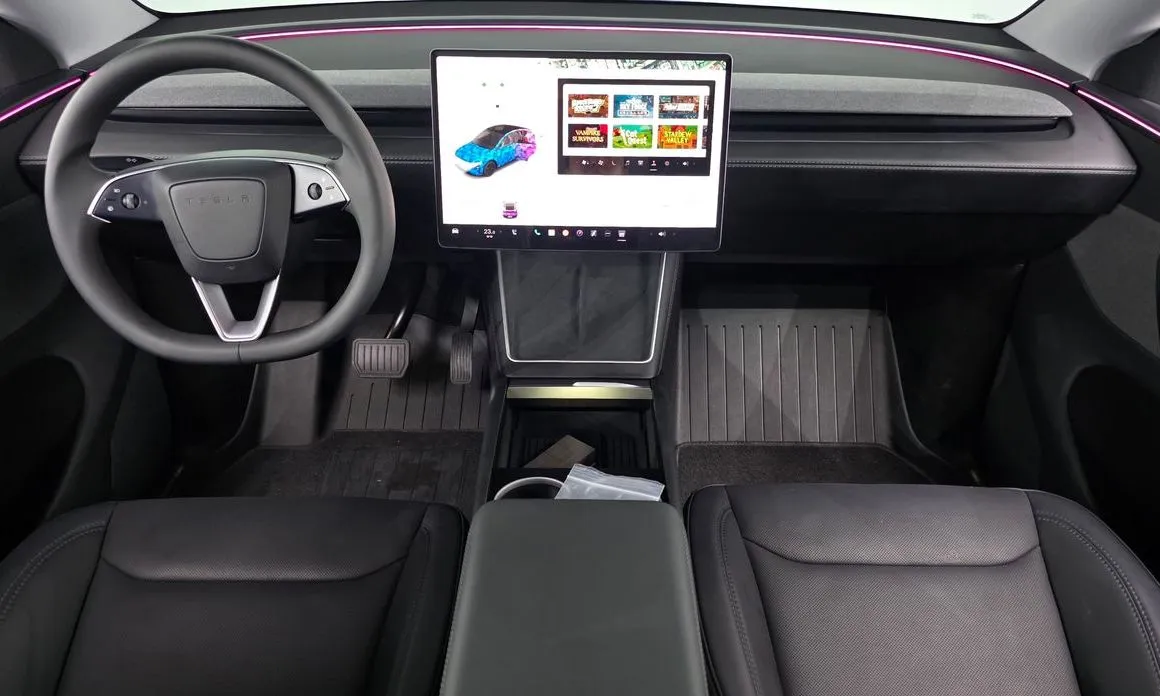 Tesla Model Y — фото 10