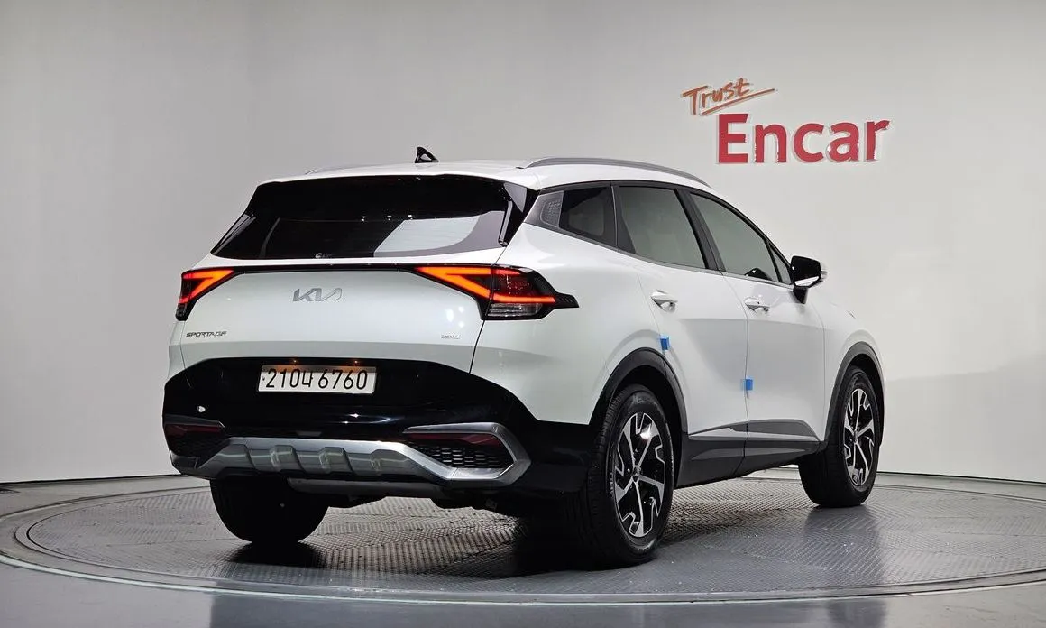 Kia Sportage — фото 10