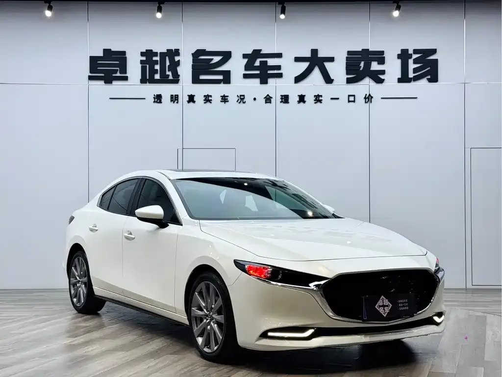 Mazda 3 Axela — фото 1