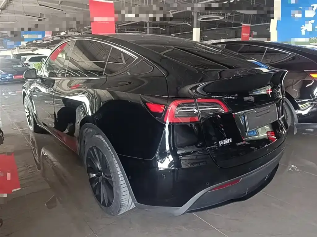 Tesla Model Y — фото 7
