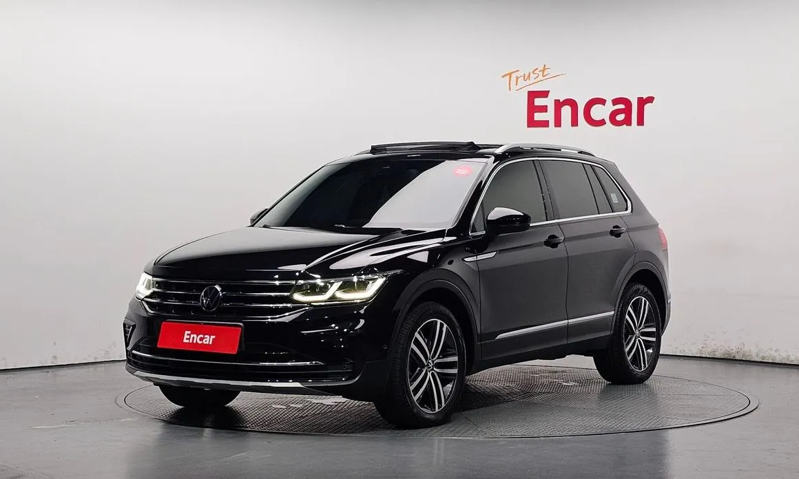 Volkswagen Tiguan — фото 1