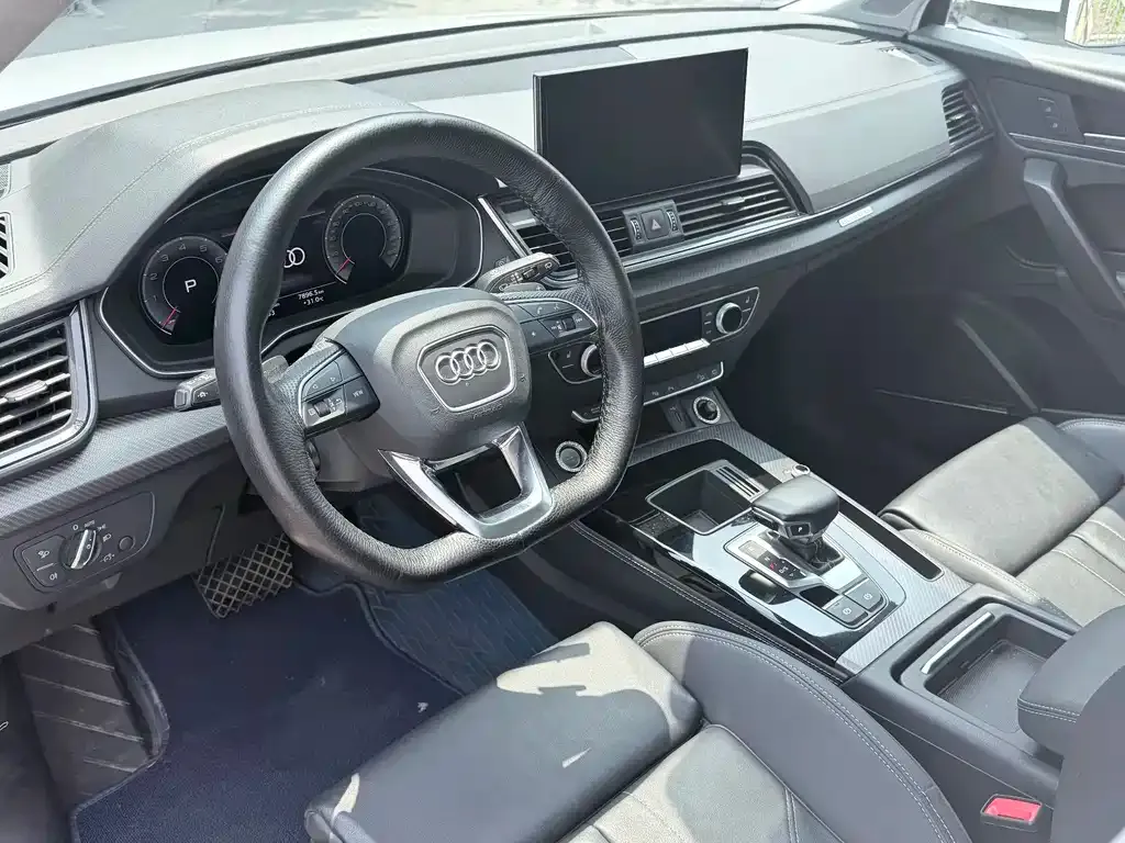 Audi Q5L — фото 6