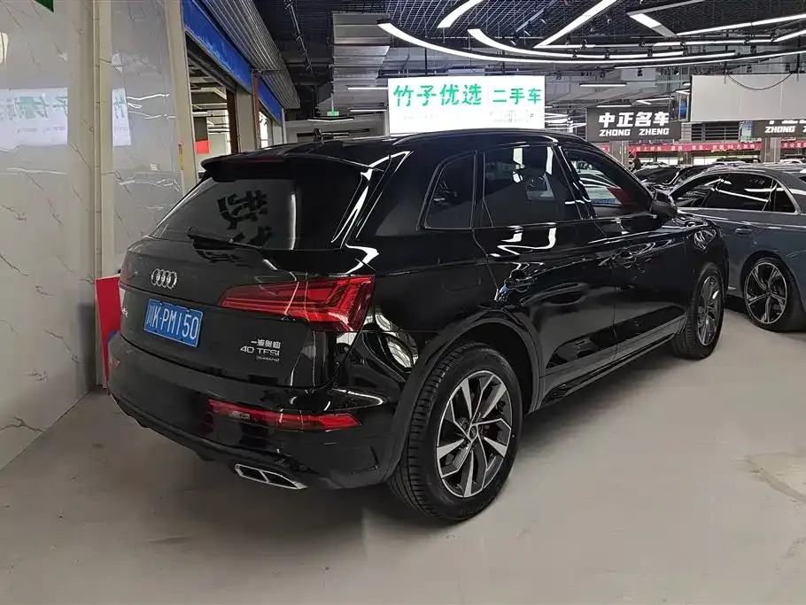 Audi Q5L — фото 10