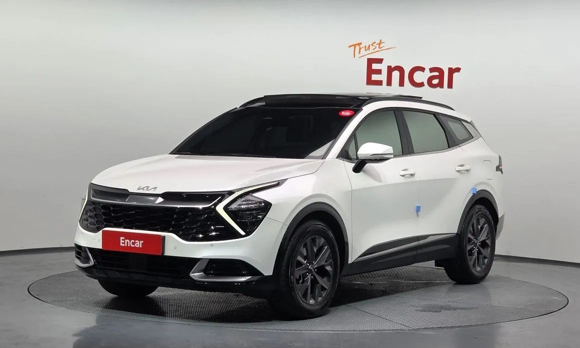 Kia Sportage — фото 1