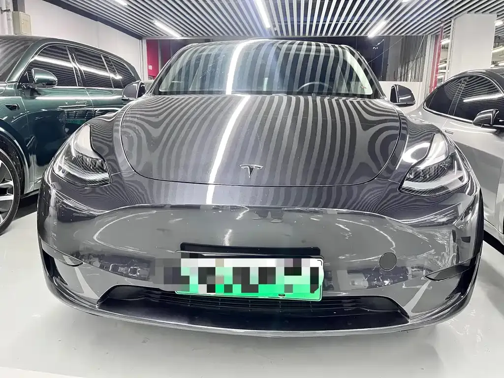 Tesla Model Y — фото 10