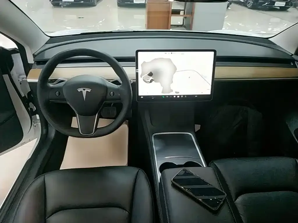 Tesla Model 3 — фото 7