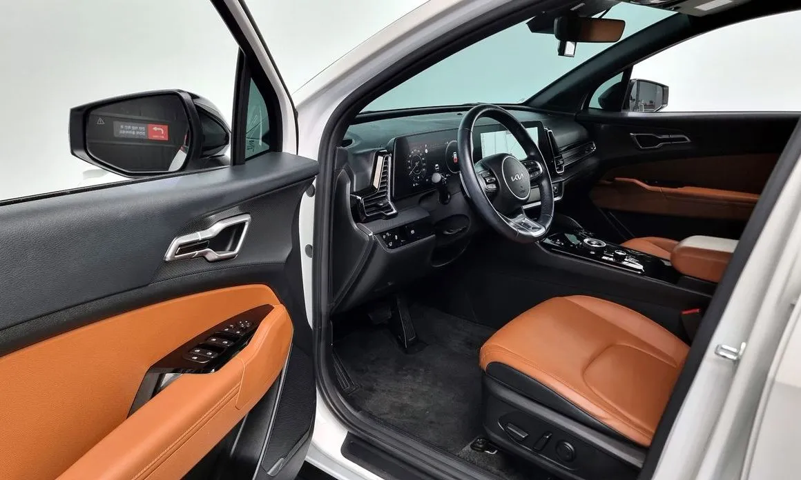 Kia Sportage — фото 10