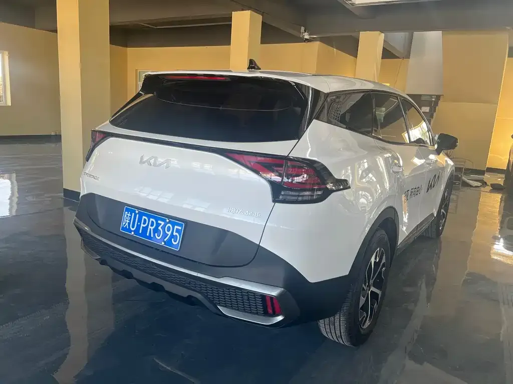 Kia Sportage — фото 7