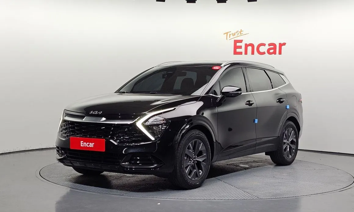 Kia Sportage — фото 1