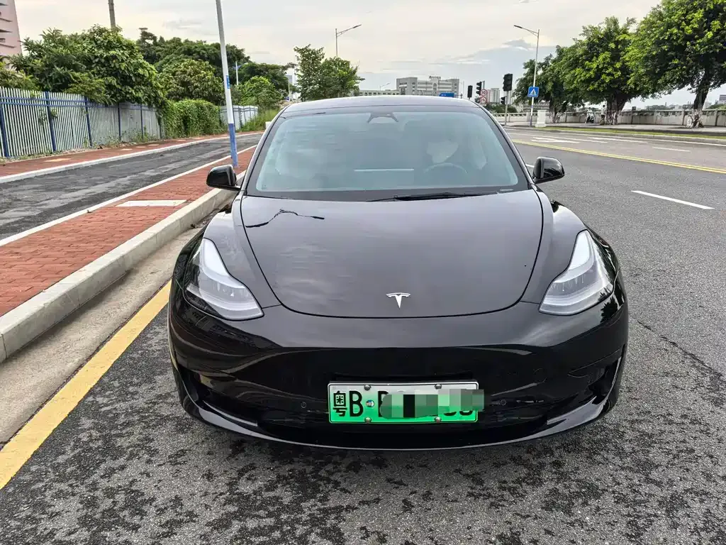 Tesla Model 3 — фото 7
