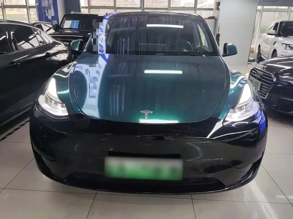 Tesla Model Y — фото 7