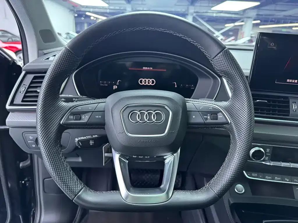 Audi Q5L — фото 6