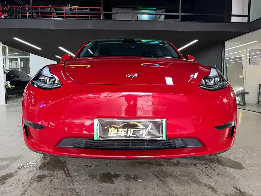 Tesla Model Y — фото 10