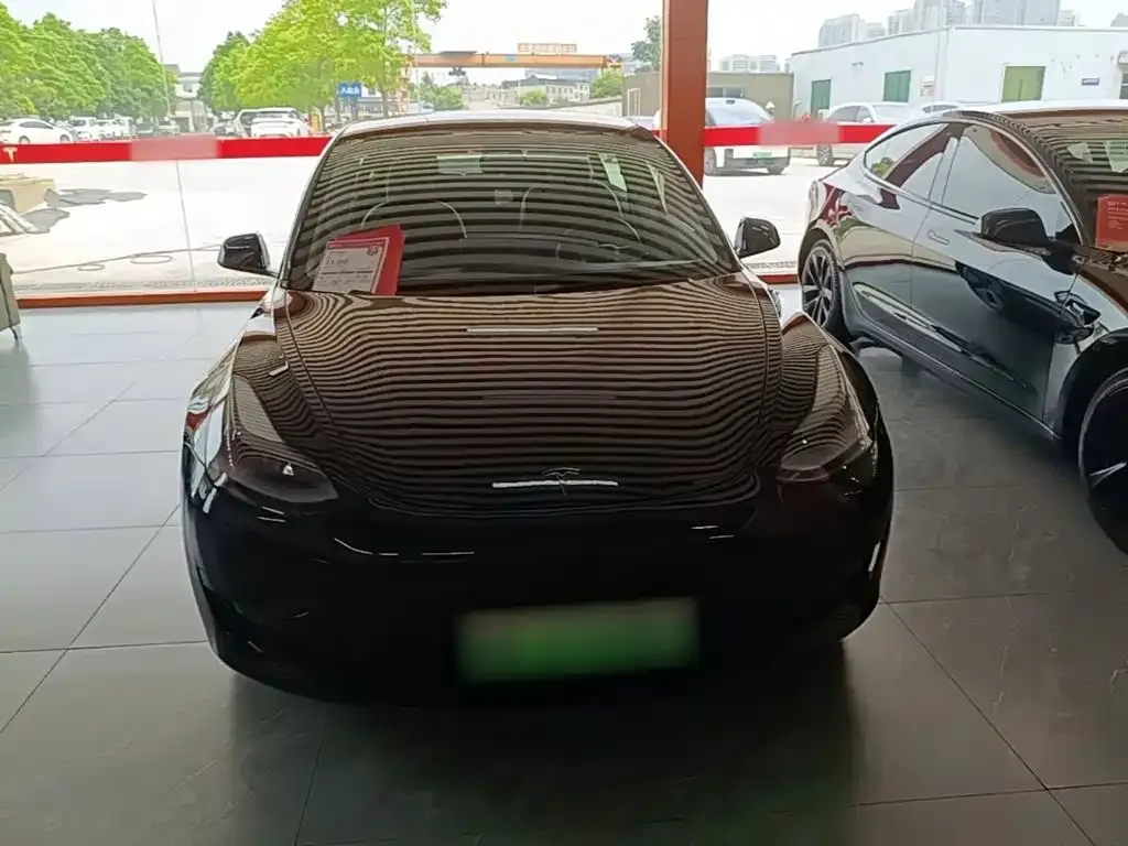 Tesla Model 3 — фото 10
