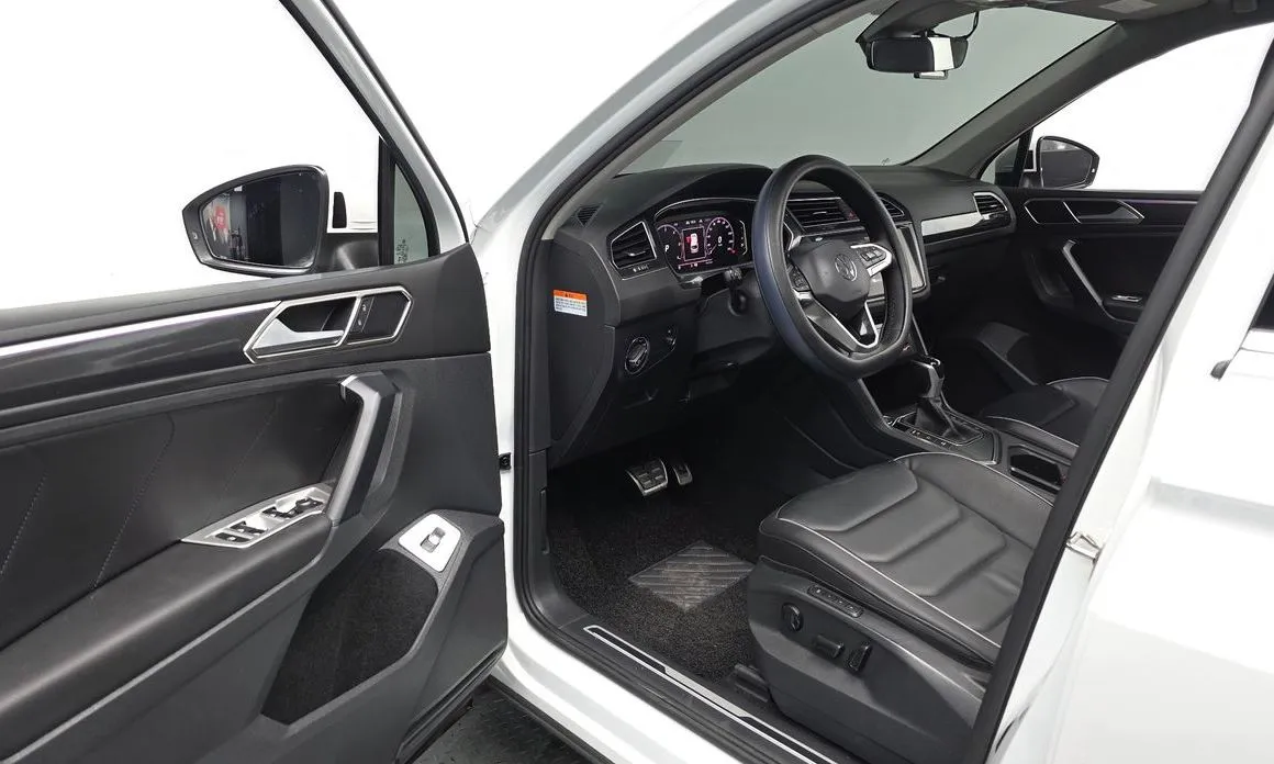 Volkswagen Tiguan — фото 6