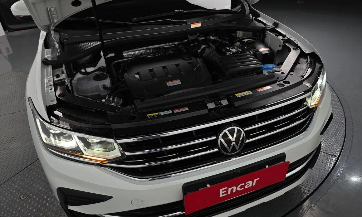 Volkswagen Tiguan — фото 10