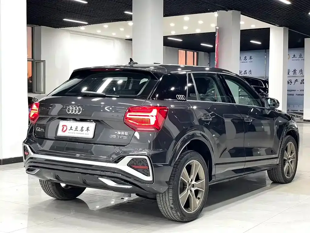Audi Q2L — фото 7