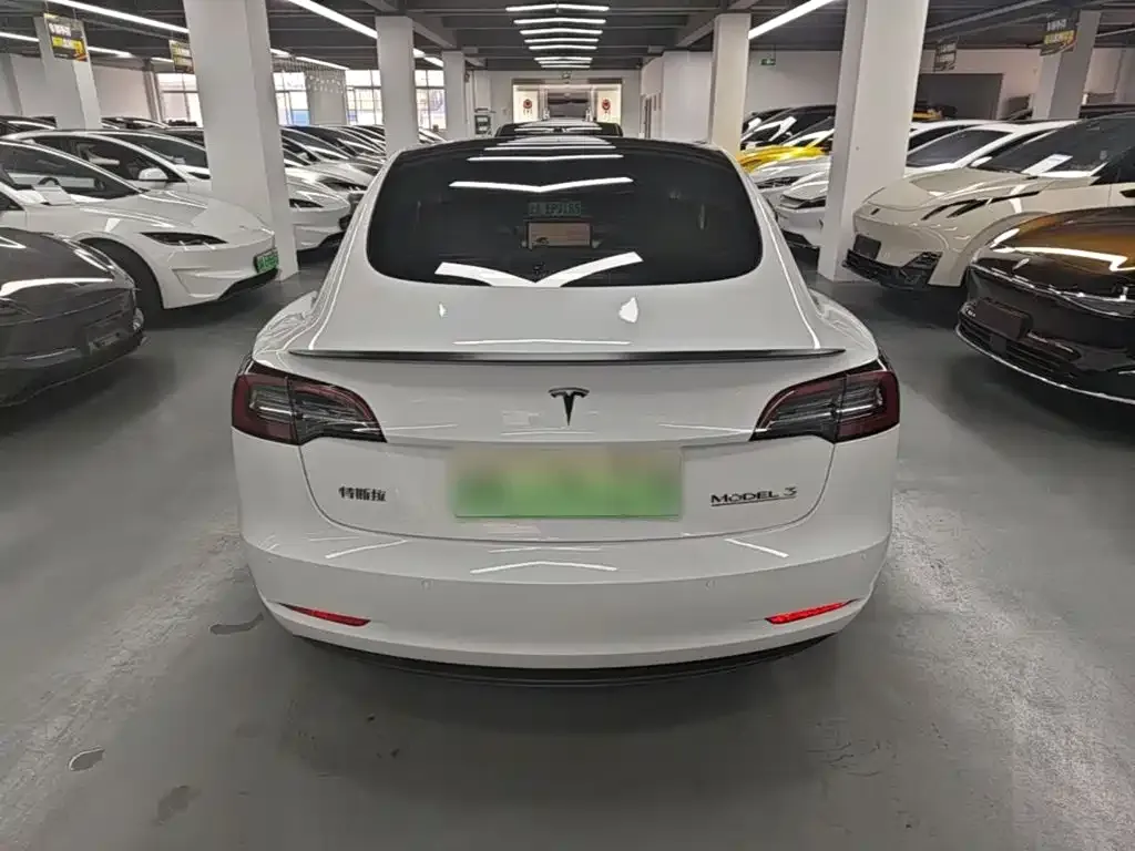 Tesla Model 3 — фото 7