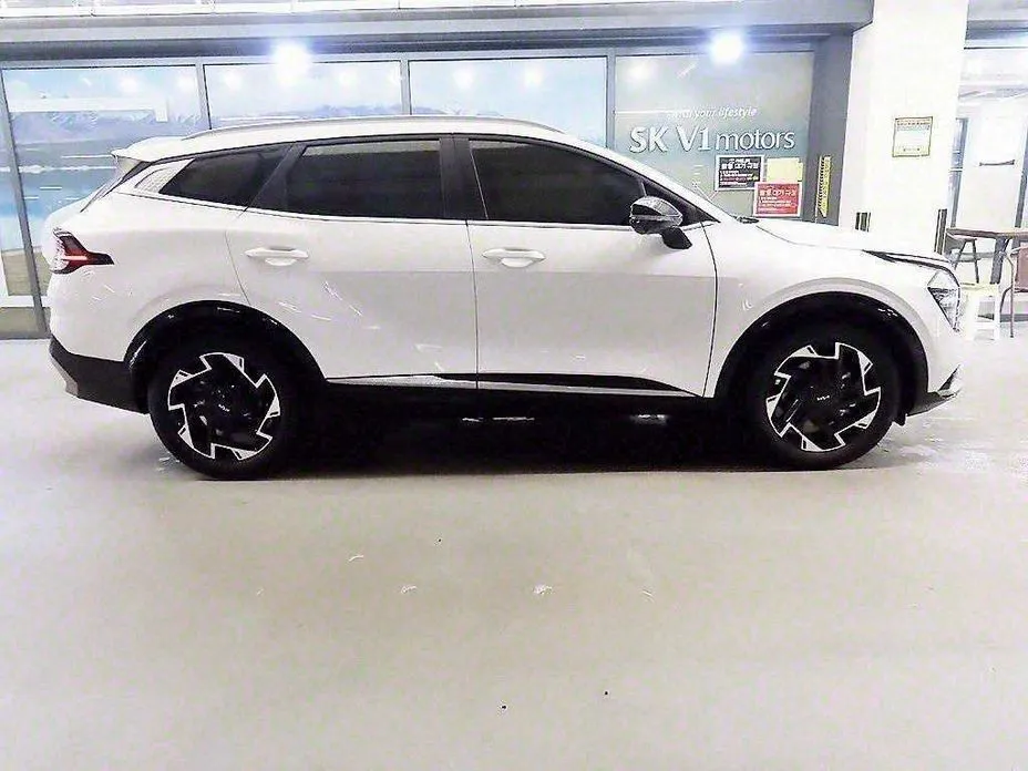 Kia Sportage — фото 10