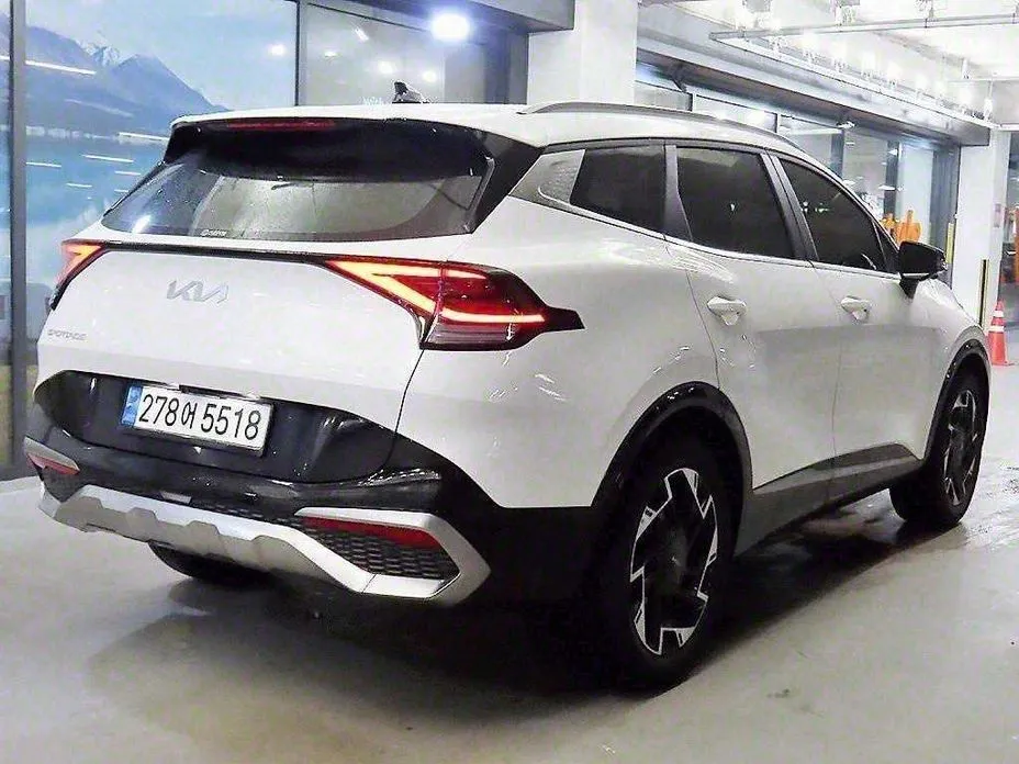 Kia Sportage — фото 7
