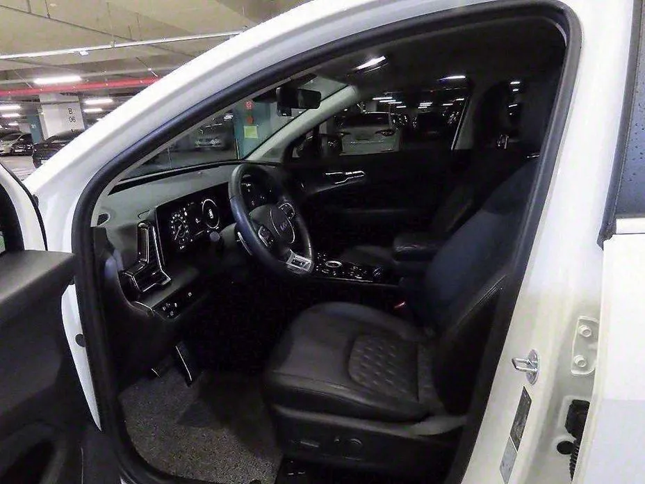Kia Sportage — фото 9