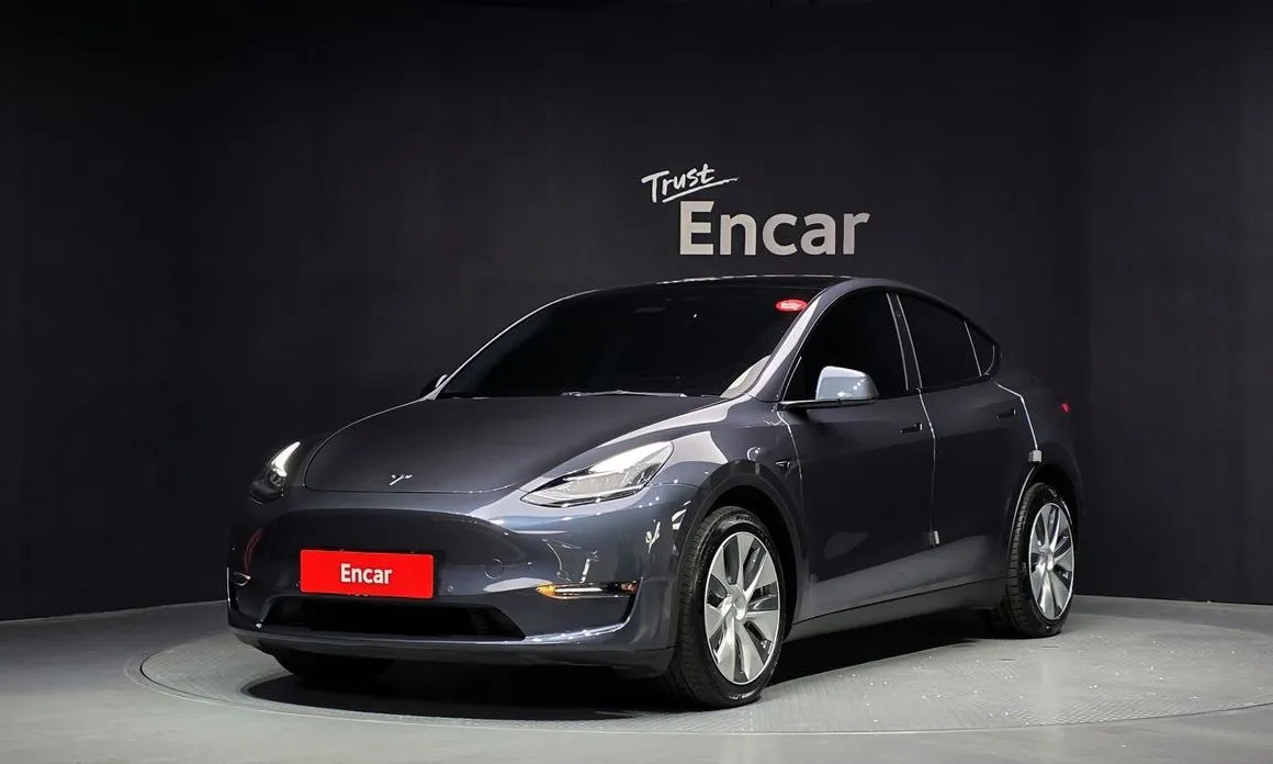 Tesla Model Y — фото 1