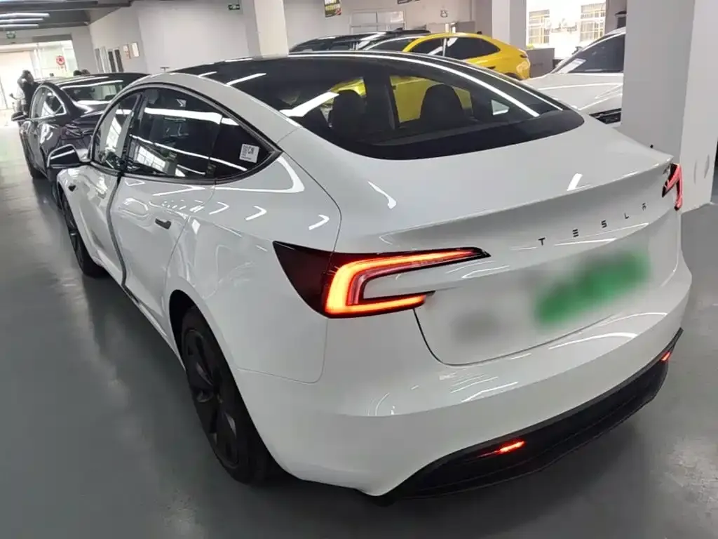 Tesla Model 3 — фото 5