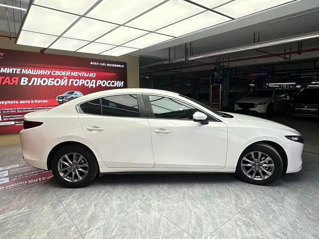Mazda 3 Axela — фото 8