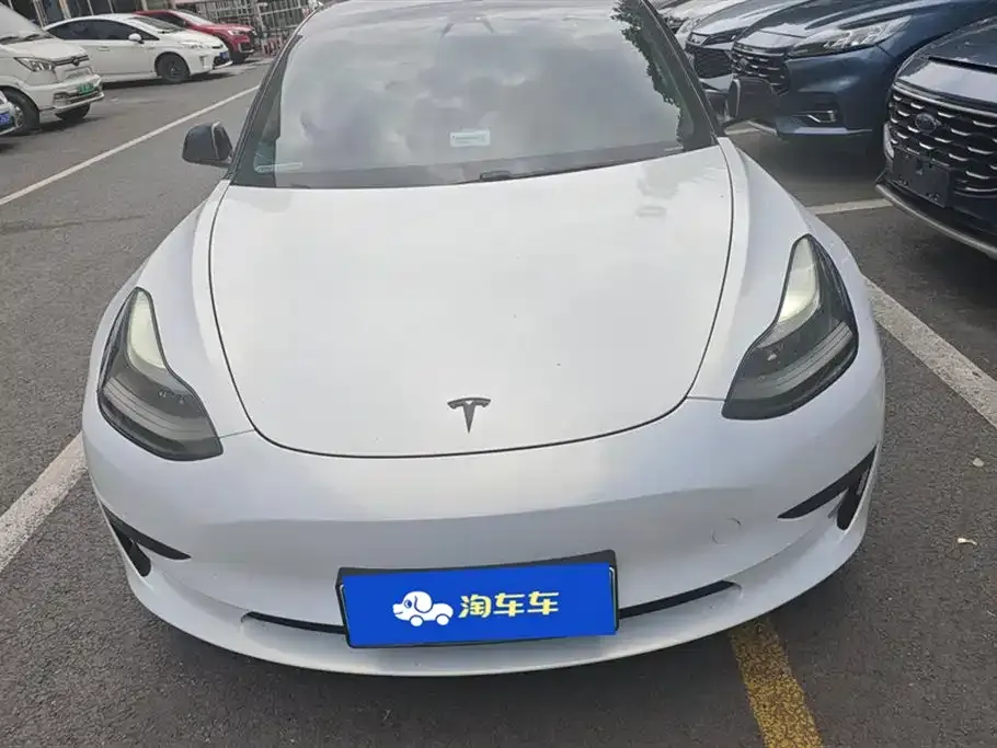 Tesla Model 3 — фото 9