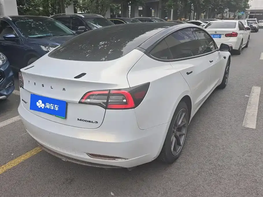 Tesla Model 3 — фото 10