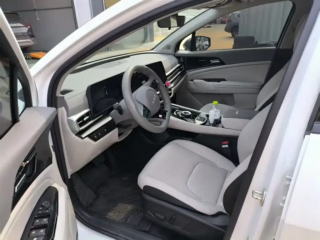 Kia Sportage — фото 8