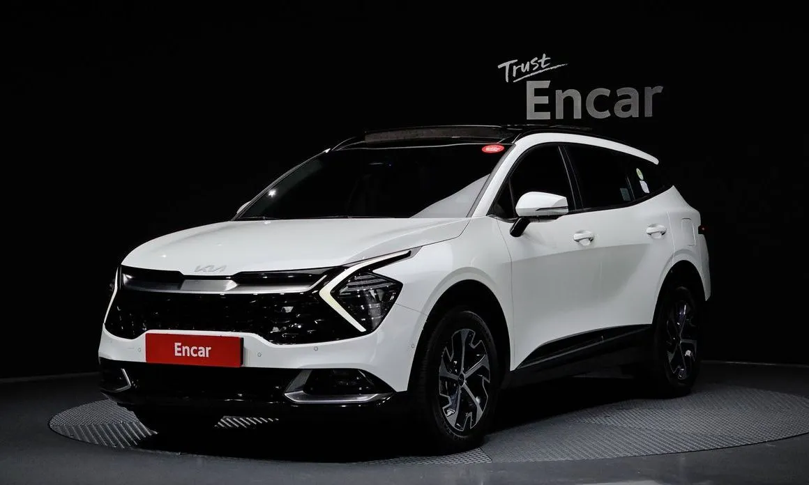 Kia Sportage — фото 1