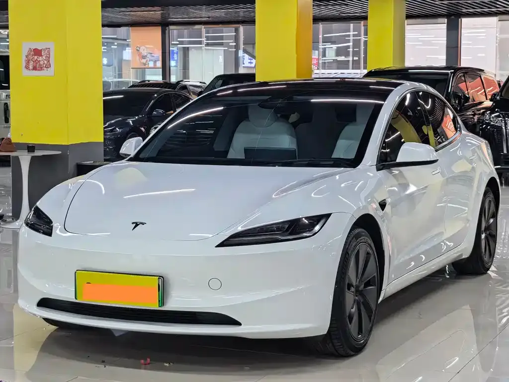 Tesla Model 3 — фото 7