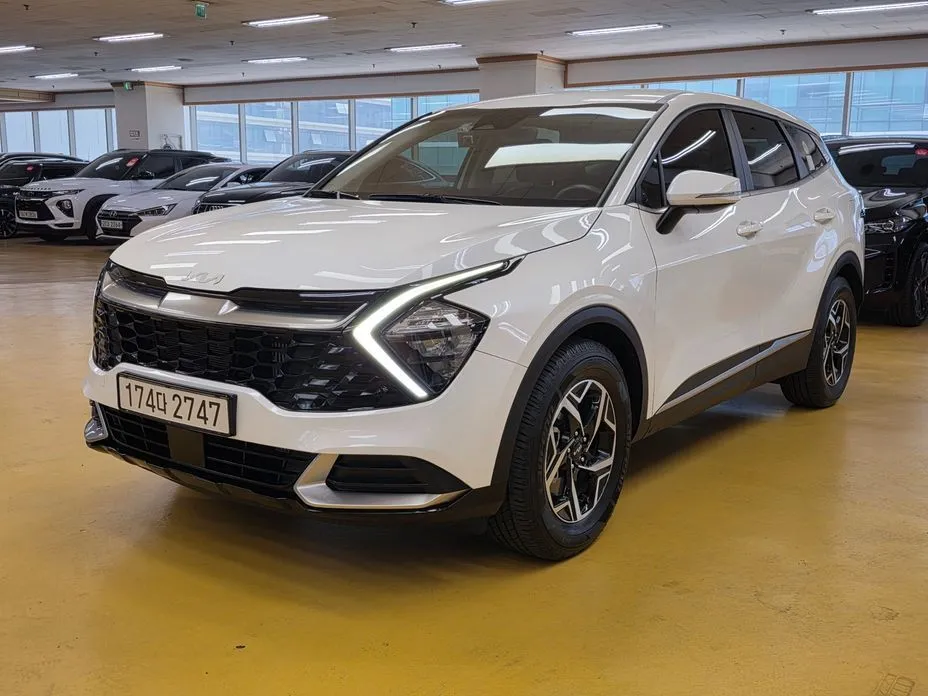 Kia Sportage — фото 1