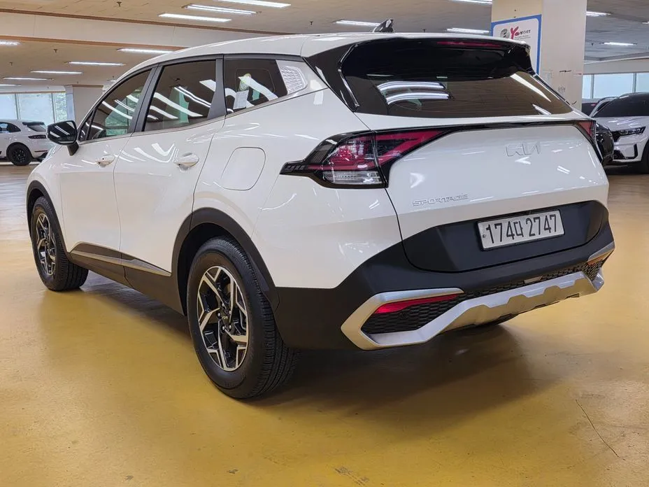 Kia Sportage — фото 7