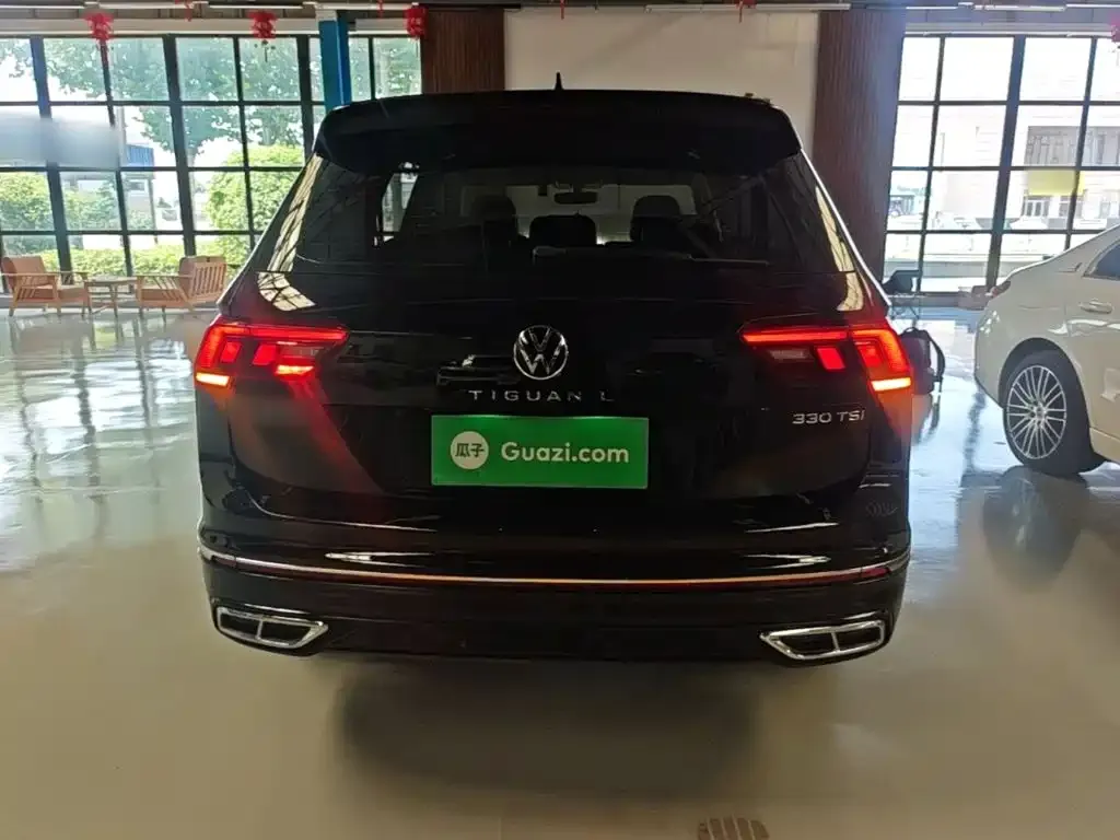 Volkswagen Tiguan L — фото 3