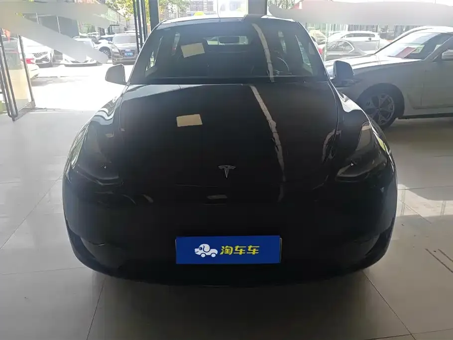 Tesla Model Y — фото 9