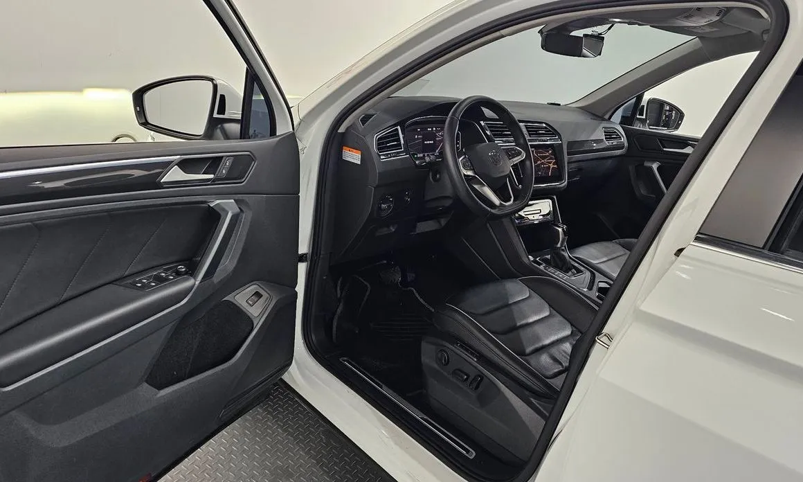 Volkswagen Tiguan — фото 10