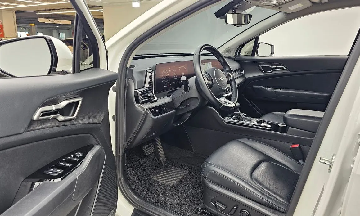 Kia Sportage — фото 7