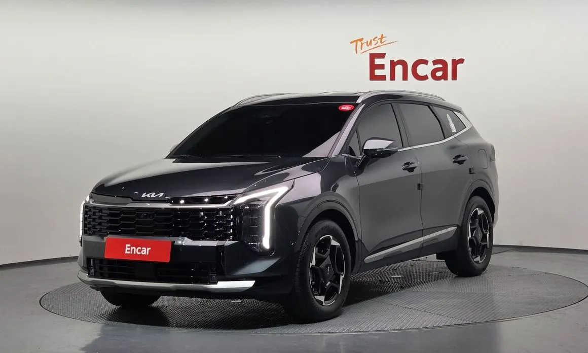 Kia Sportage — фото 1