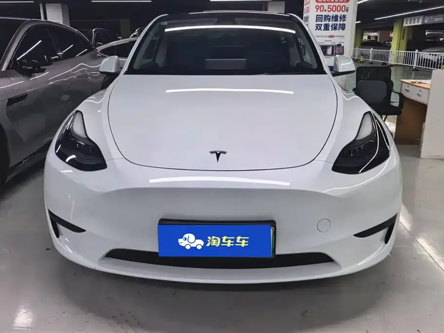 Tesla Model Y — фото 10