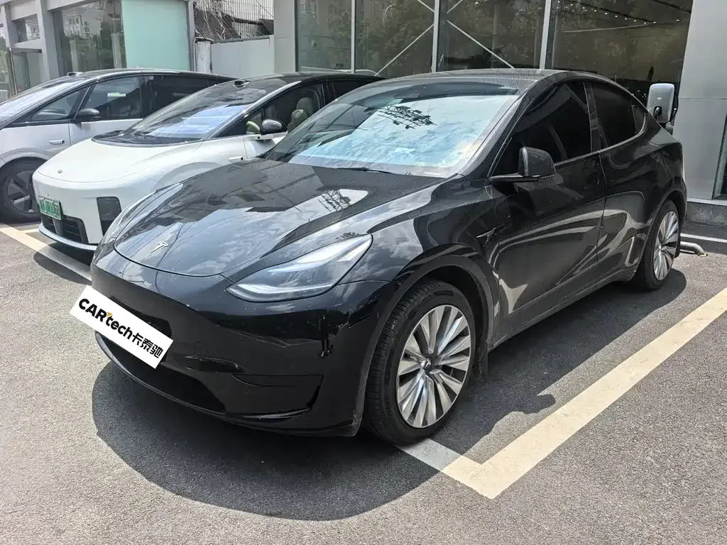 Tesla Model Y — фото 7
