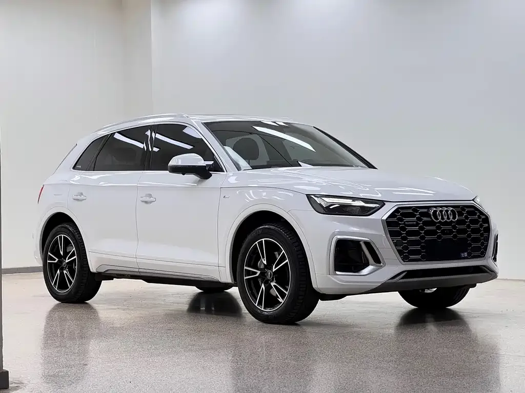 Audi Q5L — фото 5