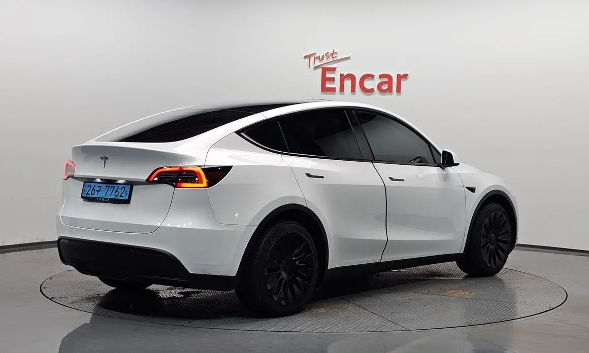 Tesla Model Y — фото 6