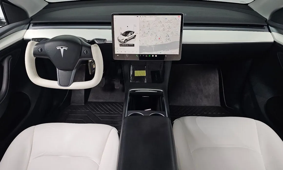 Tesla Model Y — фото 8