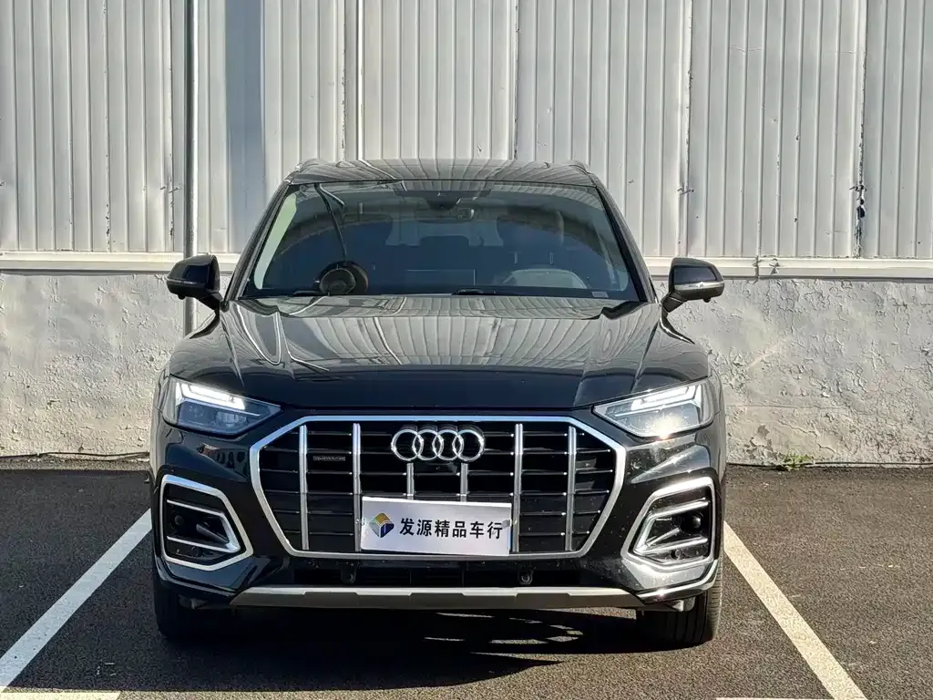 Audi Q5L — фото 9