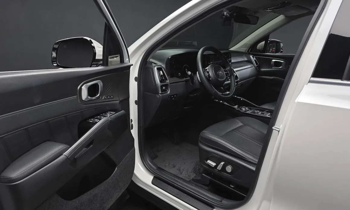 Kia Sorento — фото 7